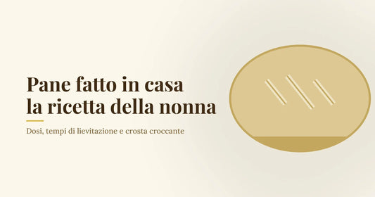 Pagnotta di pane casereccio dorata con tre tagli sulla crosta, su fondo crema